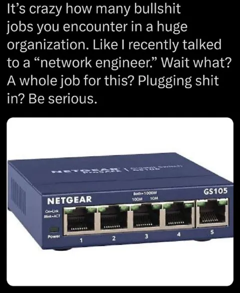 Network Engineer Plugging In Ethernet