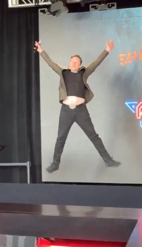 Man Jumping on Stage