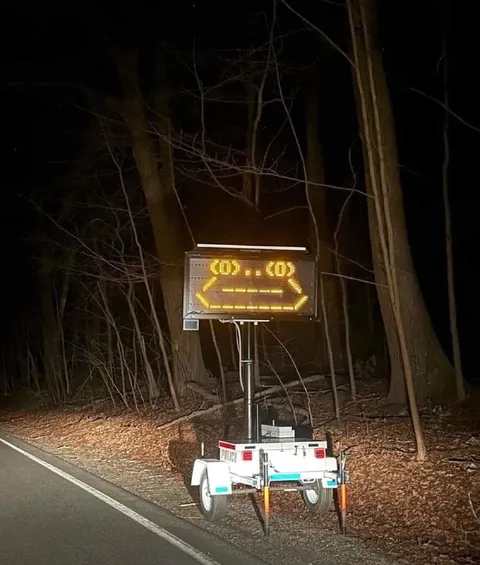 Go This Way Arrow Sign
