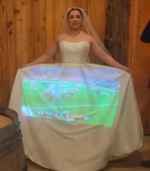 Bride Projects Football on Dress