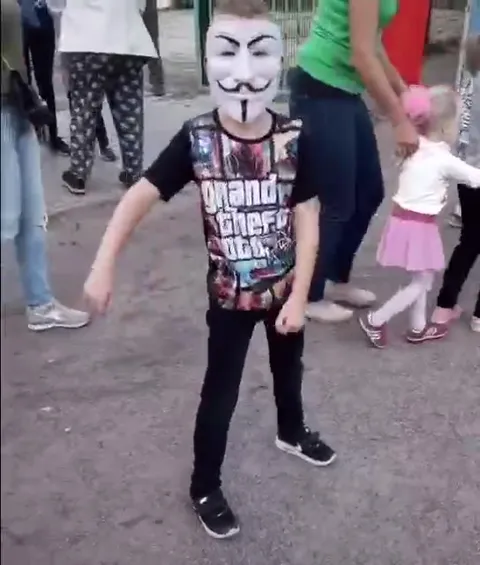 Masked GTA Kid Gives Thumbs Up