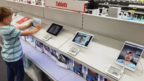 Child Surrounded by Tablets