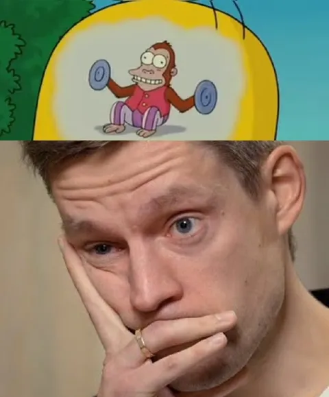 Обезьяна и задумчивый мужчина