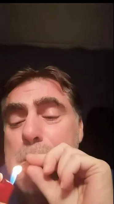 Man Lighting a Cigarette