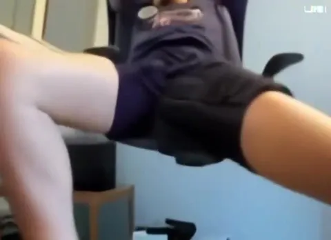 Man Laughing in Office Chair