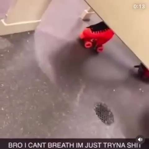 Roller Skater Crawls Under Stall Door