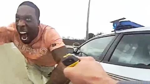 Man Screaming at a Graduation Car