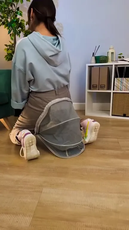 Woman Carries Cat Like a Backpack