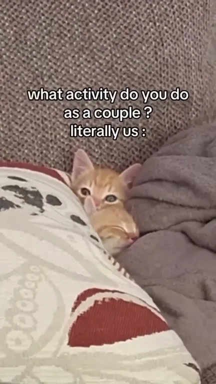 Couple Cuddling in Bed