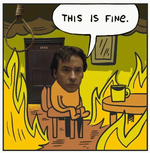 Man Sitting in Burning Room
