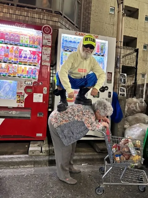 Man Riding an Elderly Woman