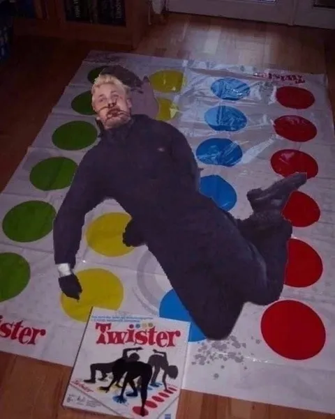Man Losing at Twister