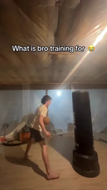 Bro Trains Against a Punching Bag