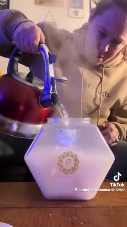 Woman Prepares a Mysterious Drink