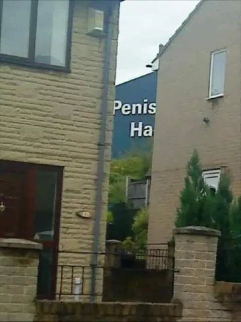 Penis Hidden Between Buildings