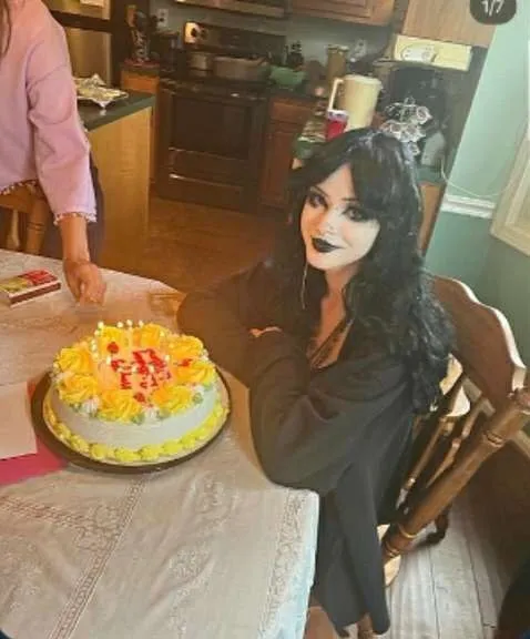Goth Woman at Birthday Cake