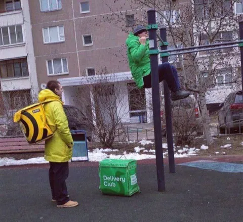 Delivery Man Climbs the Playground