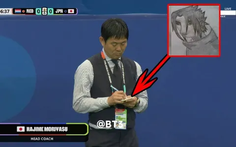 Coach Drawing Anime During Match
