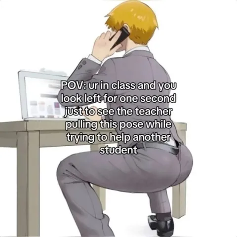 Teacher Helping Another Student
