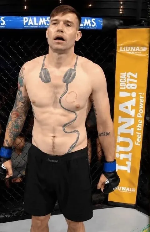 MMA Fighter With Headphone Tattoos