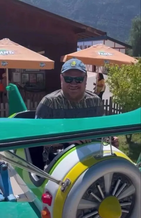 Man on a carnival ride