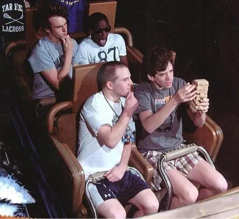 Guys Watching Jenga Tower