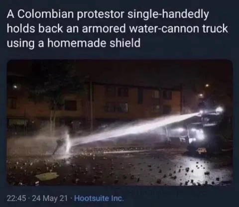 Protester Versus Water Cannon