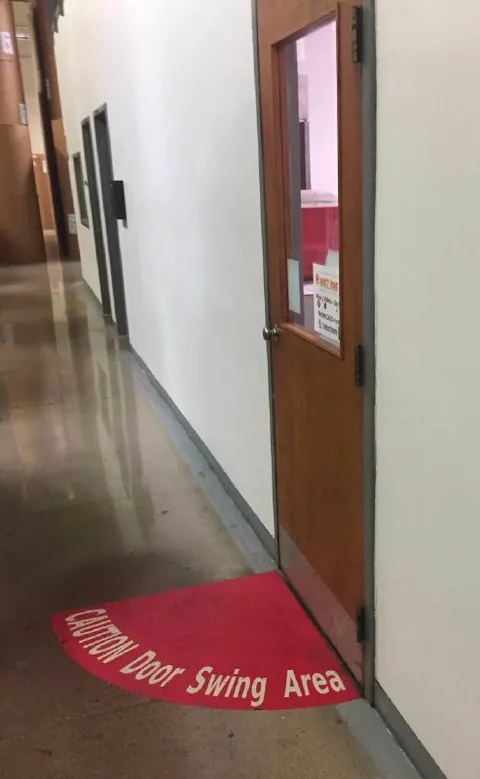 Caution Door Swing Area
