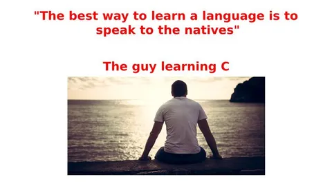 Guy Learning C by the Sea