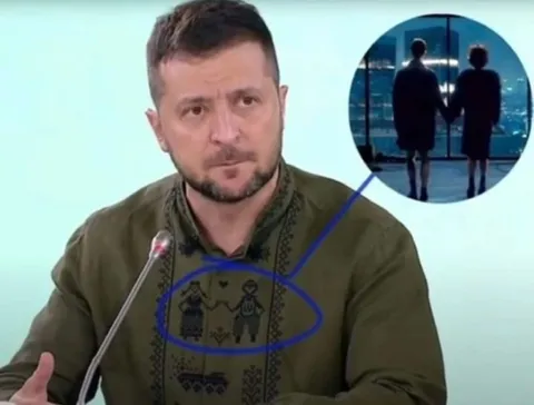 Зеленский показывает на вышивку