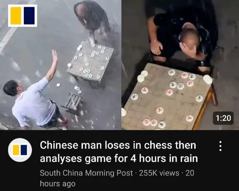 Chinese Man Analyzes Chess in Rain