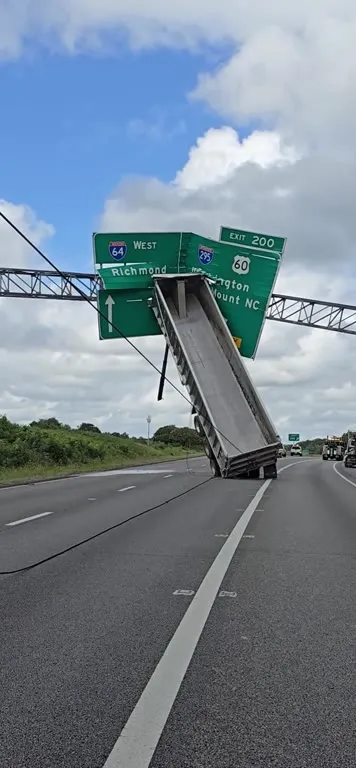 Dump truck takes the exit sign