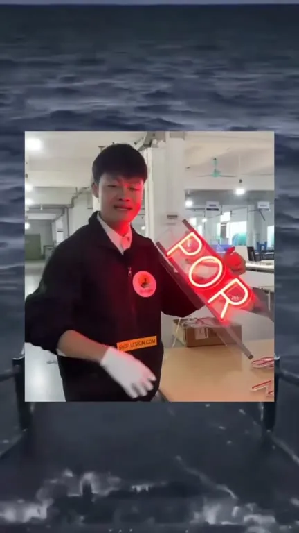 Man Shows Off a Neon POP Sign