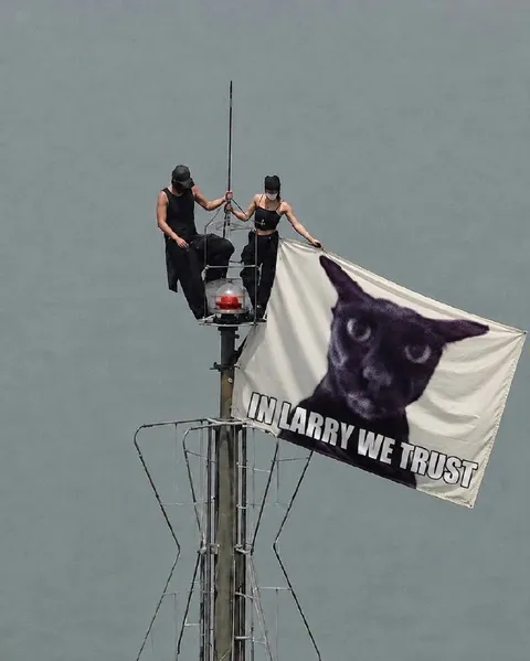 In Larry We Trust Flag