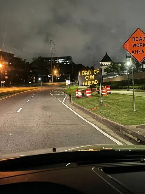 Load of Cum Ahead Road Sign
