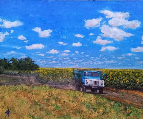 Синий грузовик в подсолнухах