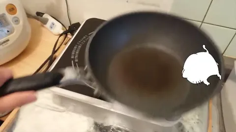 Кот в сковороде