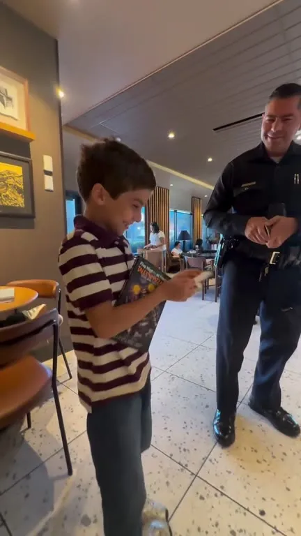 Boy Gets a Police Badge