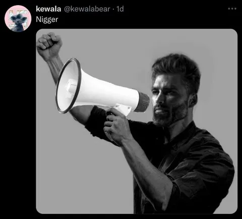 Man Shouting Through Megaphone