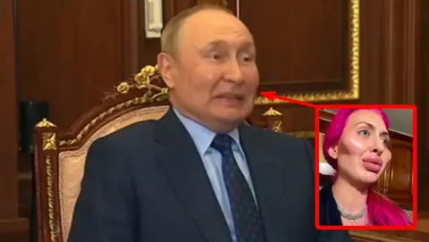 Путин смотрит на розоволосую девушку