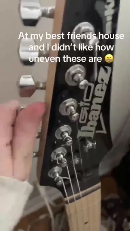 Uneven Guitar Strings at a Friend’s House