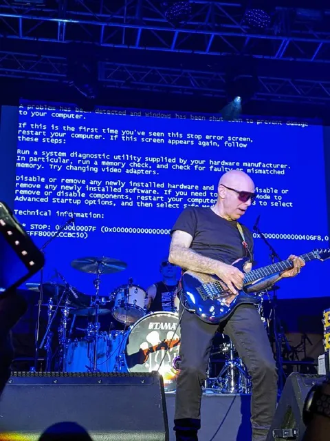 Guitarist Performs Through Blue Screen