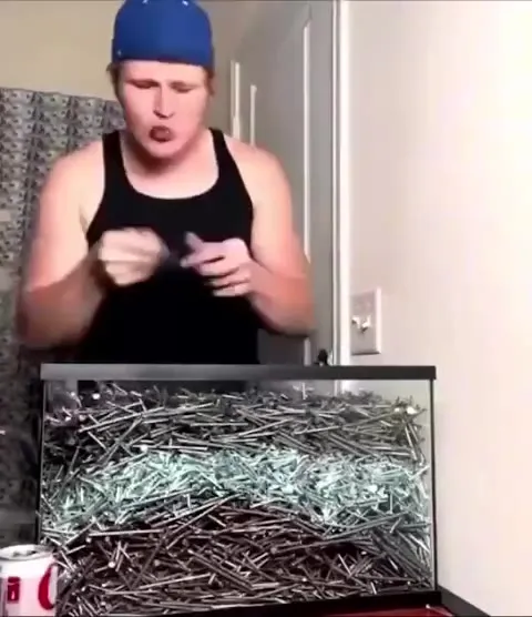 Guy vs 150lbs of Nails