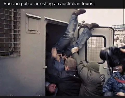 Russian Police Arresting Australian Tourist