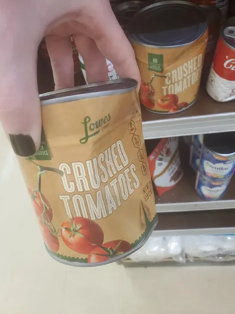 Crushed Tomatoes in Hand