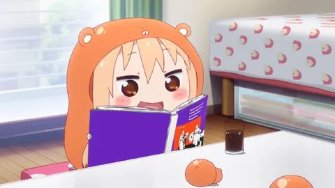 Умару читает книгу