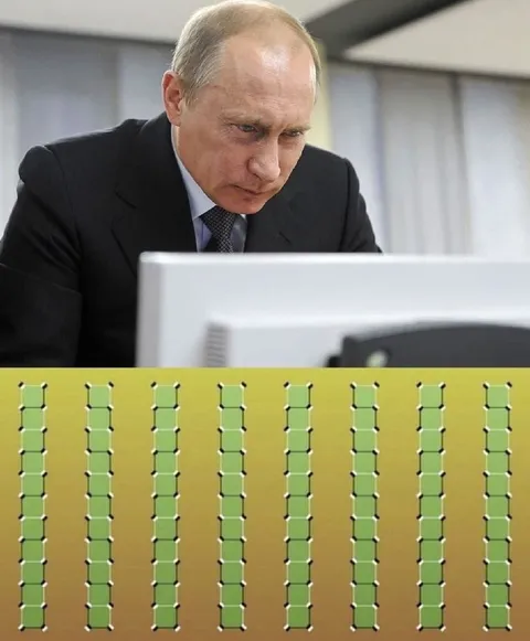 Путин смотрит на монитор