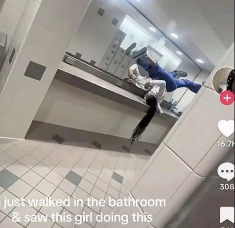 Girl Doing This in the Bathroom