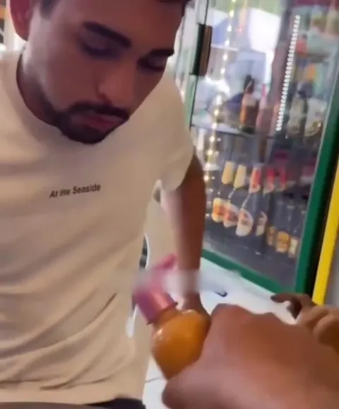 Man Shares His Food With a Dog