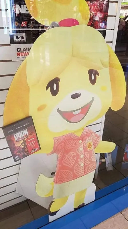 Isabelle Holding a Game Case